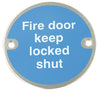 Sign D76mm-Fire door keep lockd shut SAA
